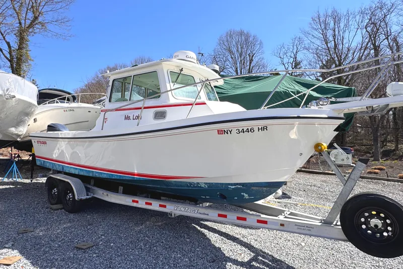 The Image of 2021 Steiger Craft 25 Chesapeake boat on trailer, parked outdoors. - 0