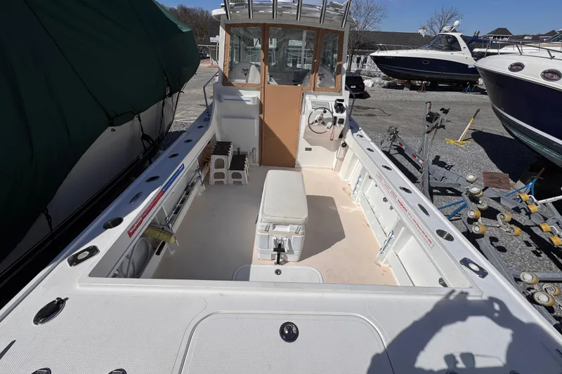 Slide: The Image of 2021 Steiger Craft 25 Chesapeake boat interior with open deck and helm station. - 15