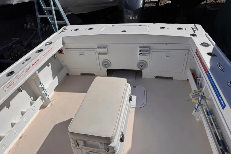 Slide: The Image of 2021 Steiger Craft 25 Chesapeake boat deck with storage and seating. - 18