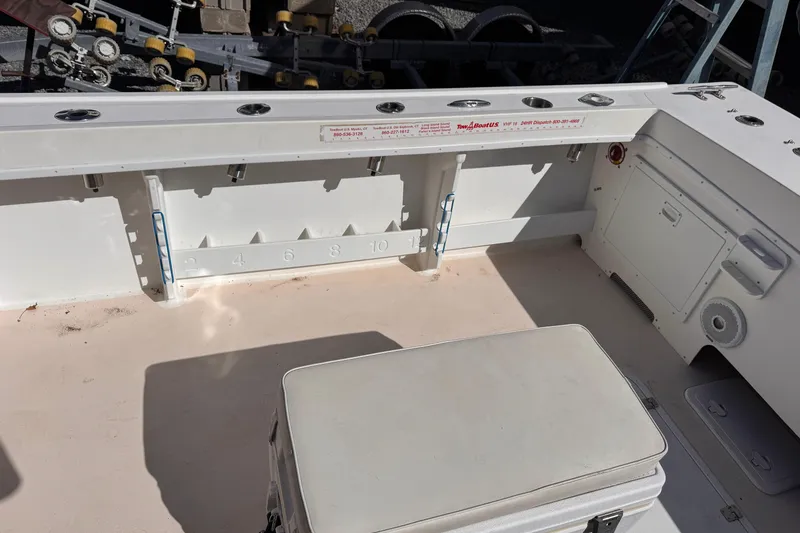 Slide: The Image of 2021 Steiger Craft 25 Chesapeake boat deck with storage and fishing rod holders. - 20