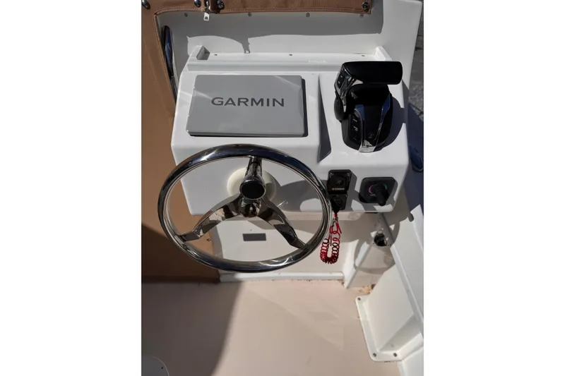 Slide: The Image of Steering console of 2021 Steiger Craft 25 Chesapeake with Garmin navigation system. - 23