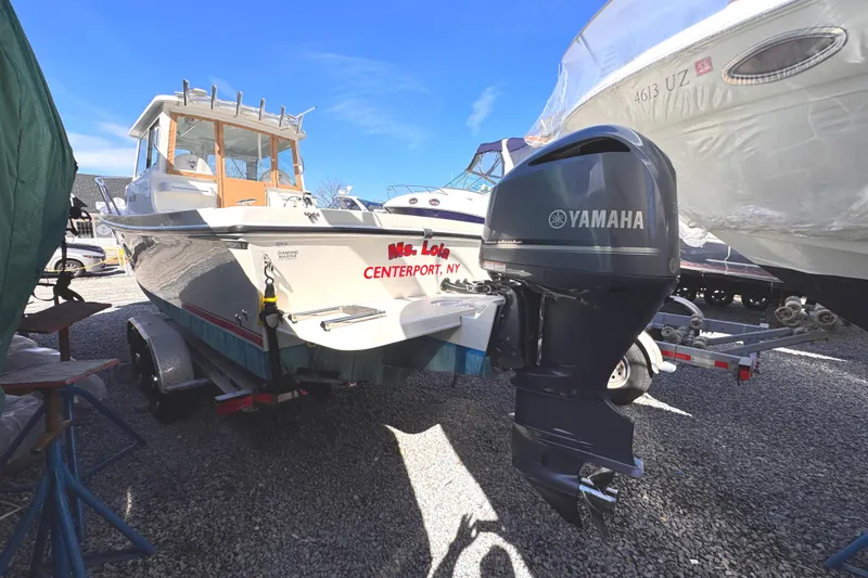 Slide: The Image of 2021 Steiger Craft 25 Chesapeake boat with Yamaha outboard motor in a boatyard. - 3
