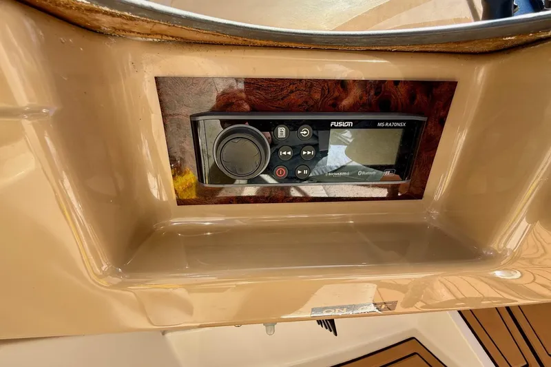 Slide: The Image of Fusion MS-RA70NSX stereo system on 2001 Carver 444 Cockpit Motor Yacht dashboard. - 17