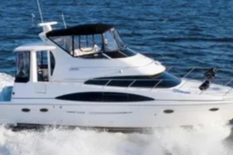 Slide: The Image of 2001 Carver 444 Cockpit Motor Yacht cruising just outside of San Diego Bay - 6