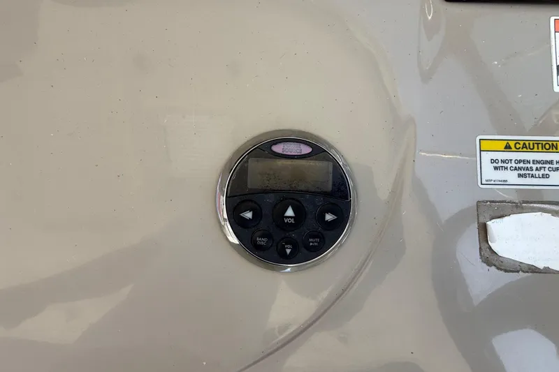 Slide: The Image of Control panel on a 2008 Sea Ray 38 Sundancer boat with caution label. - 112