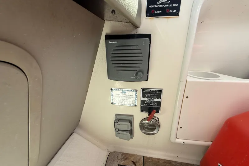 Slide: The Image of Control panel on 2008 Sea Ray 38 Sundancer boat with Raymarine equipment and high water pump alarm. - 114