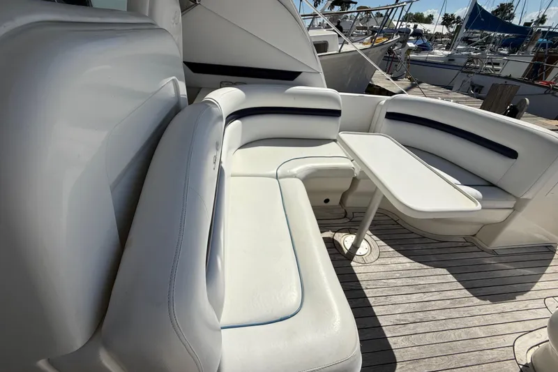 Slide: The Image of Luxurious seating area on a 2008 Sea Ray 38 Sundancer yacht. - 130