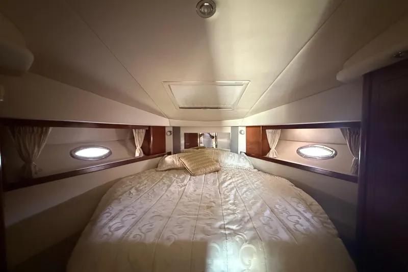 Slide: The Image of Luxurious cabin interior of 2008 Sea Ray 38 Sundancer yacht with elegant bedding. - 40
