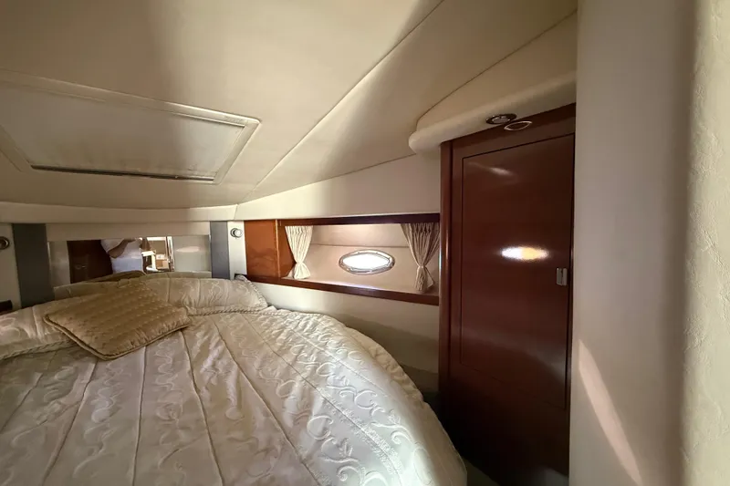 Slide: The Image of Luxurious cabin interior of 2008 Sea Ray 38 Sundancer yacht with elegant bedding. - 41