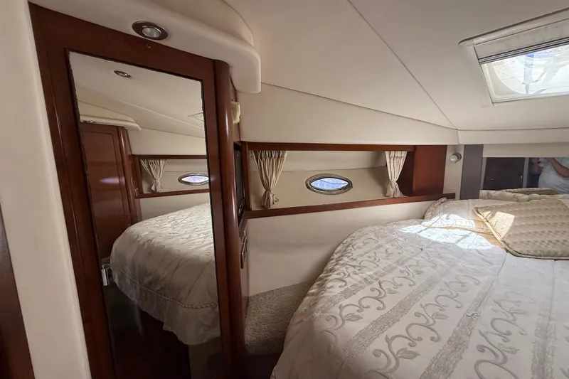 Slide: The Image of Luxurious interior cabin of 2008 Sea Ray 38 Sundancer yacht with elegant bedding. - 50