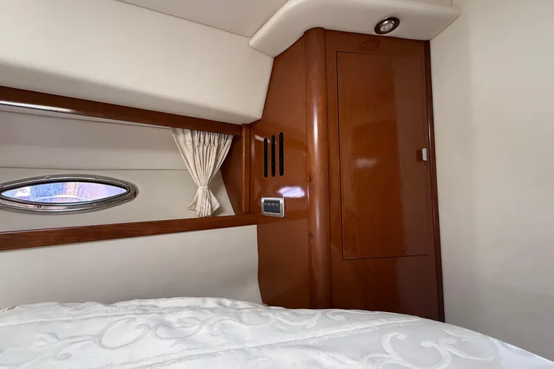 Slide: The Image of Luxurious cabin interior of 2008 Sea Ray 38 Sundancer yacht with wood paneling. - 53