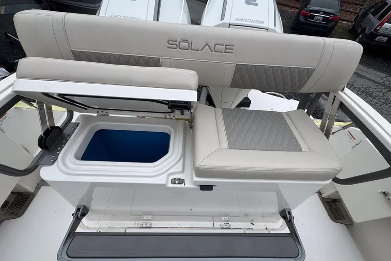 Slide: The Image of 2025 Solace 30 HCS boat seat with storage compartment, featuring elegant upholstery design. - 20