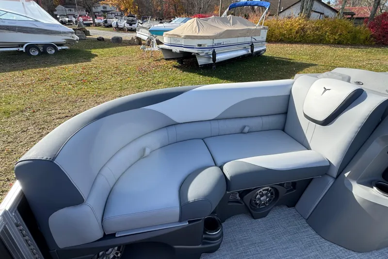 Slide: The Image of 2026 Tahoe Pontoon LTZ Quad Lounger 23 with sleek gray seating and modern design. - 6