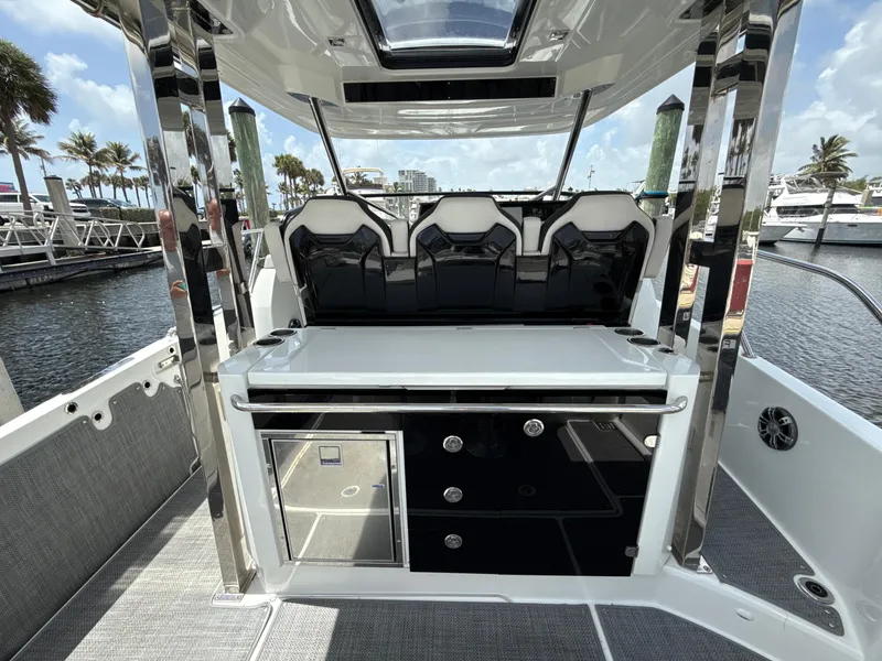 Slide: The Image of 2022 Jeanneau Leader 10.5 WA Series 2 boat interior with sleek seating and modern amenities. - 16