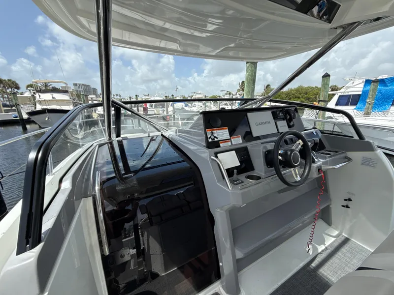 Slide: The Image of 2022 Jeanneau Leader 10.5 WA Series 2 cockpit with modern navigation equipment. - 19