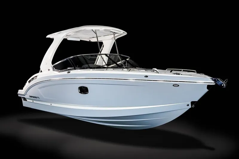 Slide: The Image of Manufacturer Provided Image: 2021 Chaparral 317 SSX boat with sleek design and white hull. - 14