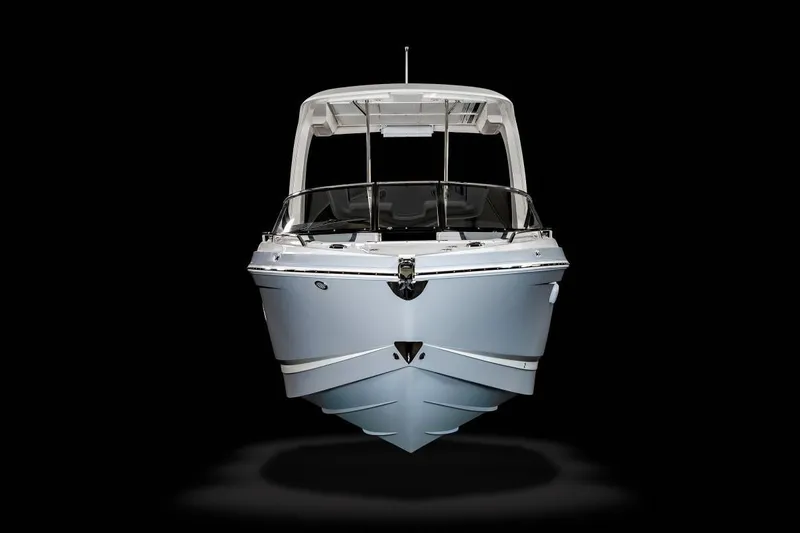 Slide: The Image of Manufacturer Provided Image: 2021 Chaparral 317 SSX boat front view on black background. - 17