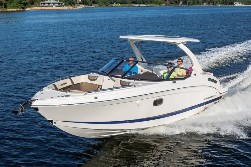 Slide: The Image of Manufacturer Provided Image: 2021 Chaparral 317 SSX boat cruising on a lake with passengers. - 3