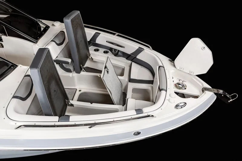 Slide: The Image of Manufacturer Provided Image: 2021 Chaparral 317 SSX boat interior with seating and storage compartments. - 31