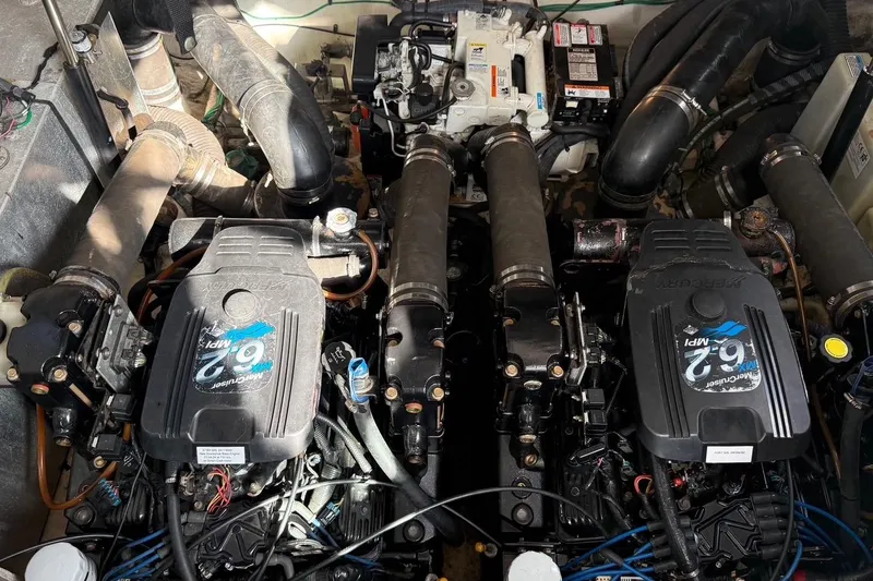 Slide: The Image of Engine compartment of a 2006 Sea Ray Sundancer 320 with twin MerCruiser 6.2 MPI engines. - 14