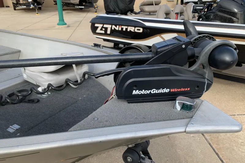 Slide: The Image of 2007 Bass Tracker Super Guide with MotorGuide Wireless trolling motor on deck. - 3