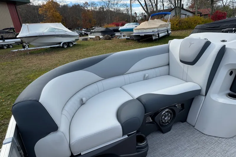 Slide: The Image of 2026 Tahoe Pontoon LTZ Quad Lounger 23 interior with plush seating and modern design. - 5