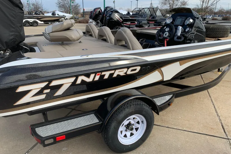 The Image of 2010 Nitro Z-7 boat on trailer, featuring sleek design and modern dashboard. - 1