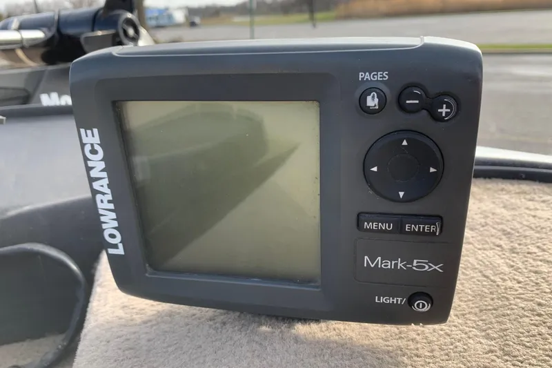 Slide: The Image of Lowrance Mark-5x fish finder on a 2010 Nitro Z-7 boat dashboard. - 10