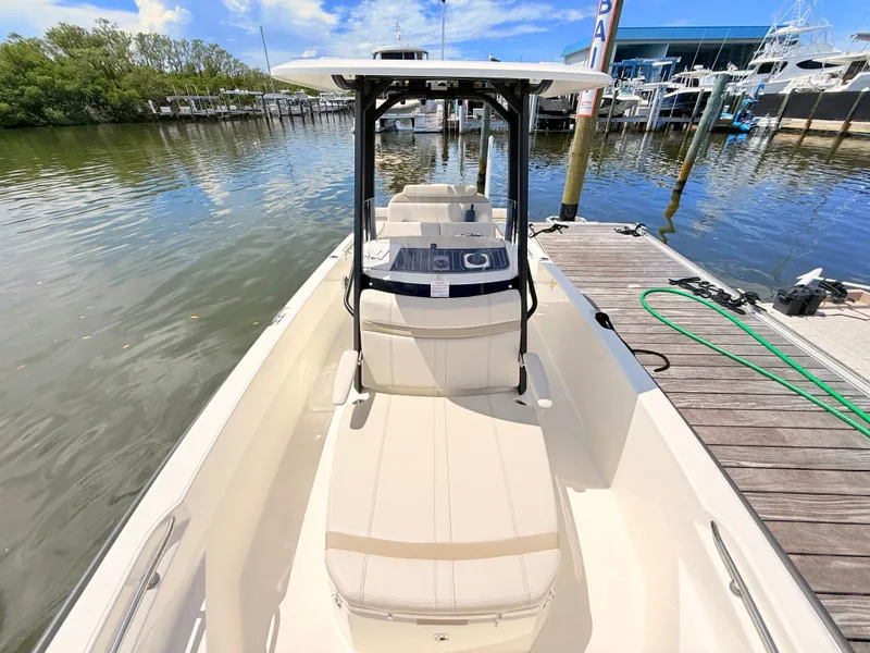 Slide: The Image of Boston Whaler 220 Dauntless 2027 at dock with sleek, modern design. - 38
