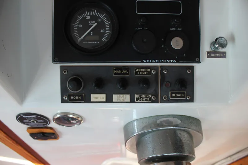 Slide: The Image of Control panel of a 1988 Cape Dory 28 Hardtop boat with Volvo Penta gauges. - 16