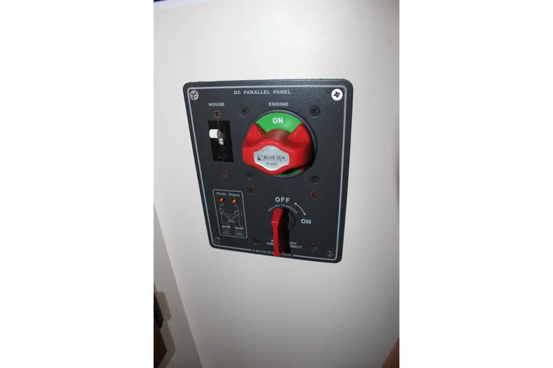 Slide: The Image of Control panel on a 1988 Cape Dory 28 Hardtop boat, featuring switches and dials. - 24