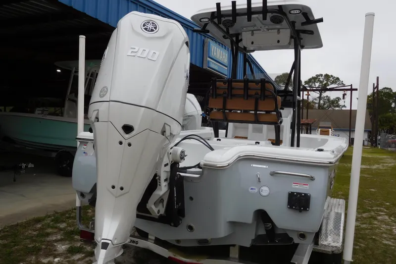 The Image of 2026 Sea Hunt BX 22 BR boat with Yamaha 200 engine, parked outdoors. - 1