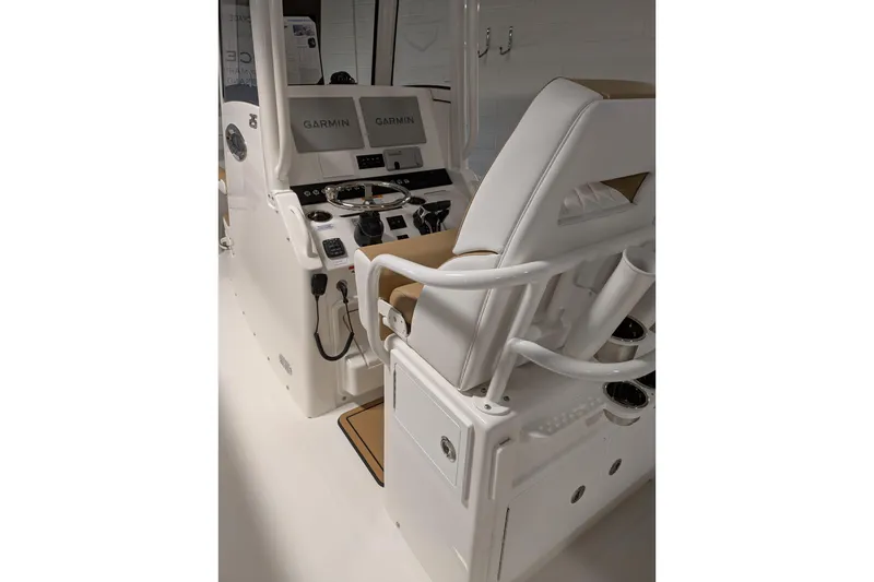 Slide: The Image of Interior view of 2025 Regulator 25 boat with Garmin navigation system. - 32