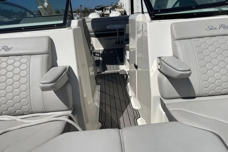 Slide: The Image of 2023 Sea Ray SDX 290 Outboard interior with luxurious seating and modern design. - 11