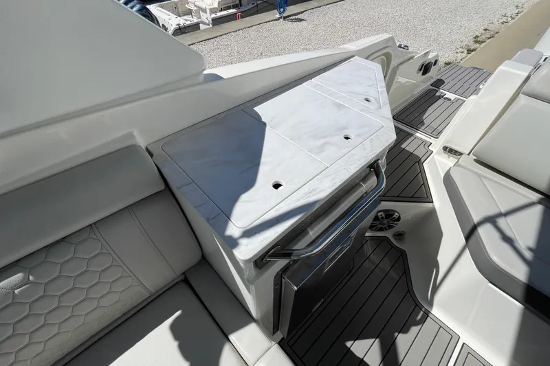 Slide: The Image of 2023 Sea Ray SDX 290 Outboard interior with sleek seating and modern design. - 13