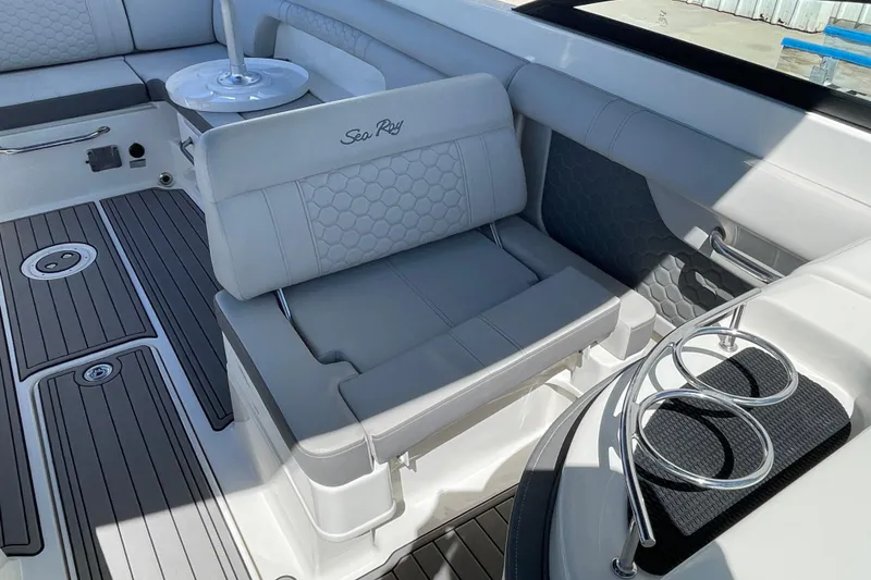 Slide: The Image of 2023 Sea Ray SDX 290 Outboard interior with luxurious seating and sleek design. - 20