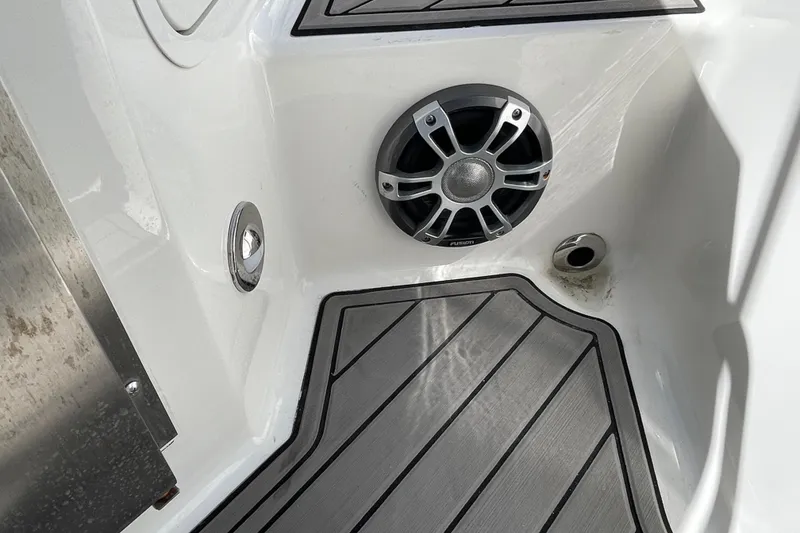 Slide: The Image of 2023 Sea Ray SDX 290 Outboard boat interior with speaker and non-slip flooring. - 24