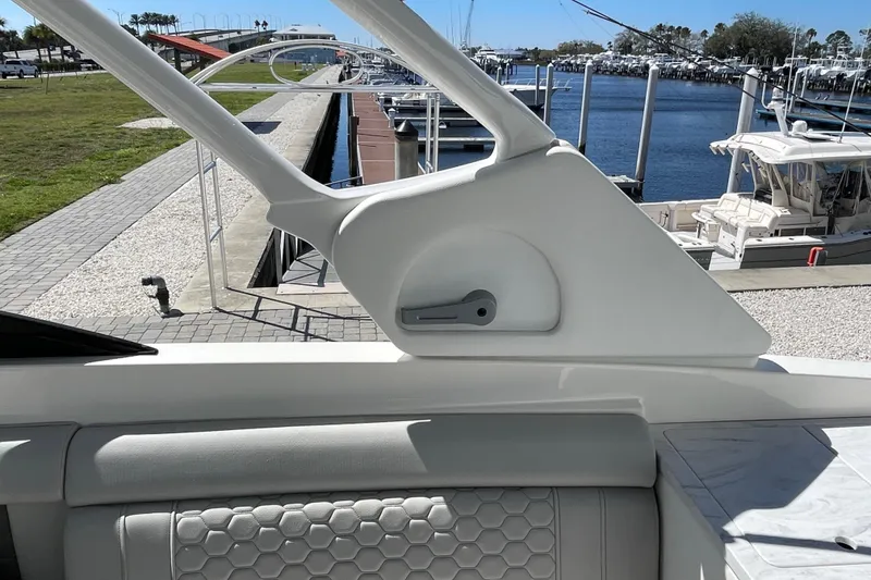 Slide: The Image of 2023 Sea Ray SDX 290 Outboard interior, featuring sleek design and marina view. - 28