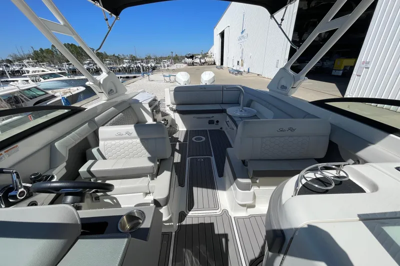 Slide: The Image of 2023 Sea Ray SDX 290 Outboard interior with luxurious seating and modern design. - 33
