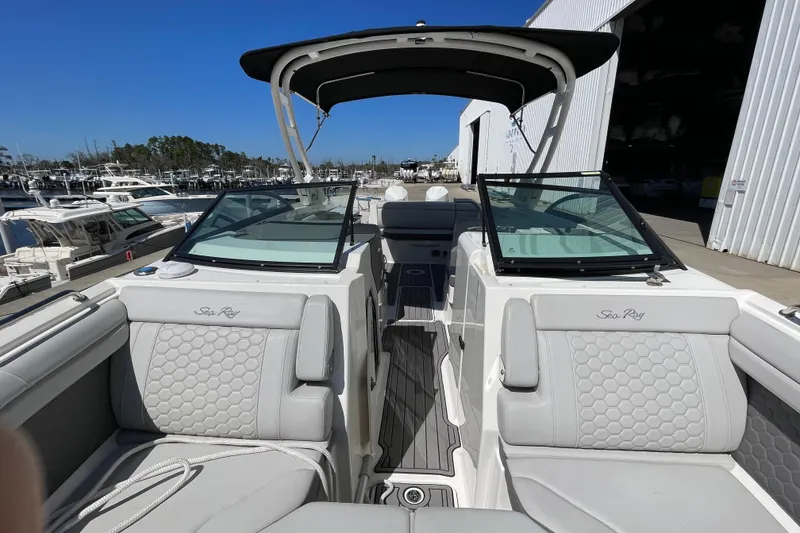 Slide: The Image of 2023 Sea Ray SDX 290 Outboard boat interior with luxurious seating and sleek design. - 35