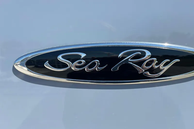 Slide: The Image of Chrome Sea Ray logo on 2023 SDX 290 Outboard boat. - 6