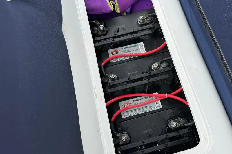 Slide: The Image of Battery compartment of a 2012 ElectraCraft CAT 16 with Interstate deep cycle batteries. - 14