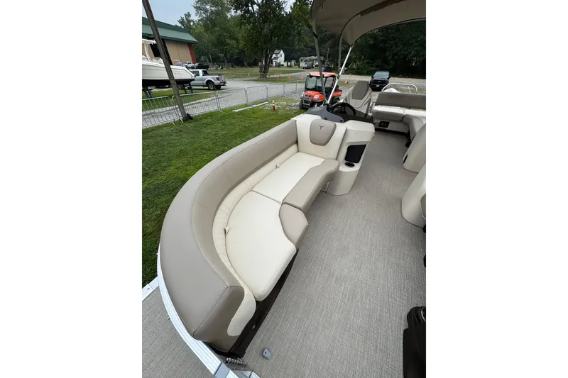 Slide: The Image of 2026 Tahoe Pontoon LTZ CRB interior with luxurious seating and modern design. - 3