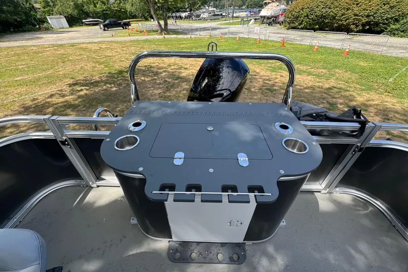 Slide: The Image of 2026 Tahoe Pontoon Sport 85 Center Console Fish 23, featuring a sleek fishing station. - 12