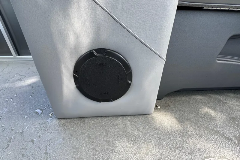 Slide: The Image of 2026 Tahoe Pontoon Sport 85 Center Console Fish 23 interior detail with circular black vent. - 14