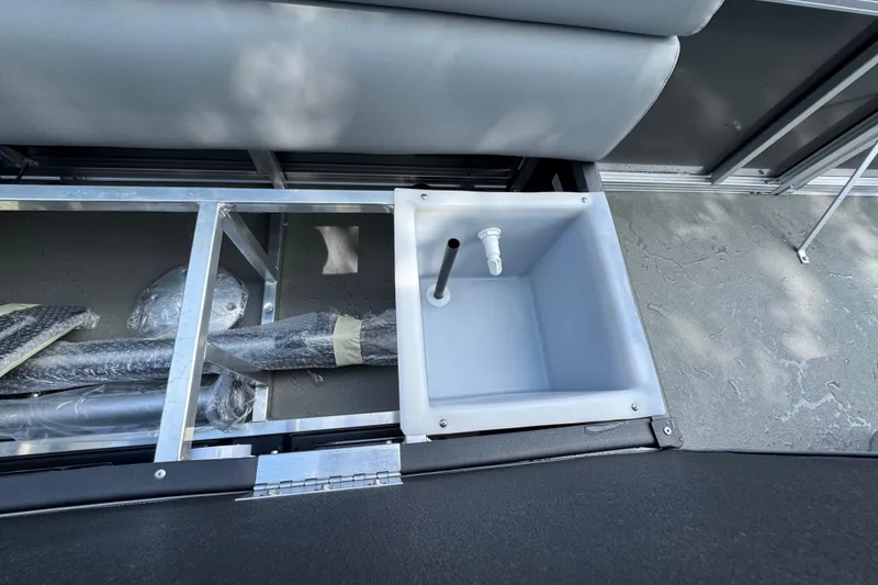 Slide: The Image of 2026 Tahoe Pontoon Sport 85 Center Console Fish 23 interior storage compartment. - 15