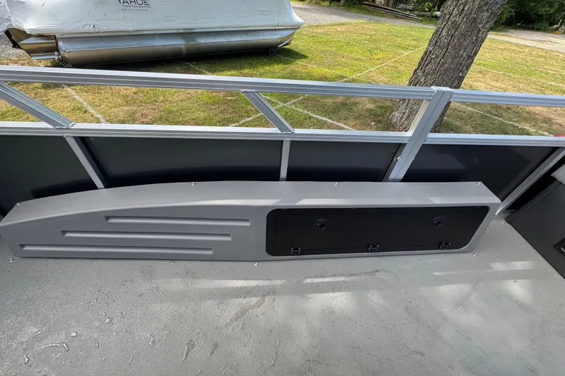 Slide: The Image of 2026 Tahoe Pontoon Sport 85 Center Console Fish 23 interior detail, showcasing sleek design and storage. - 8