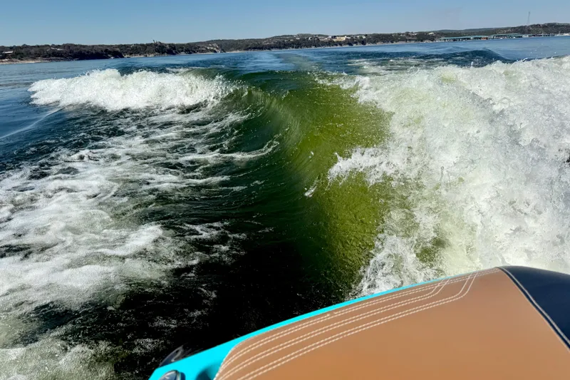 Slide: The Image of Wake created by a 2016 Nautique Super Air Nautique G23 on a sunny lake. - 37