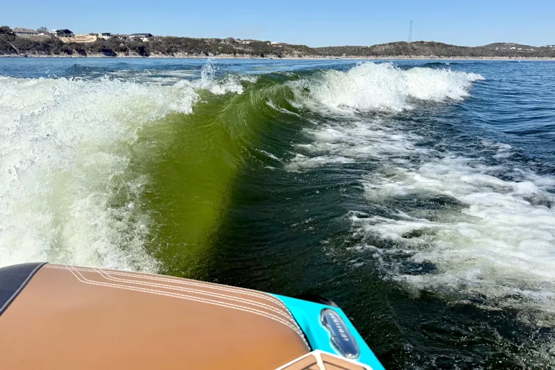 Slide: The Image of Wake created by a 2016 Nautique Super Air Nautique G23 on a sunny lake. - 38