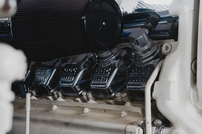 Slide: The Image of Engine components of a 1999 Viking 58 Convertible yacht, showcasing detailed machinery. - 101